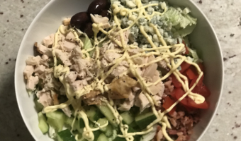 Best Keto Salad - Chicken, napa cabbage, kalamata olives, cucumbers, tomatoes, bacon, blue cheese with a drizzle of avocado oil and mayo.